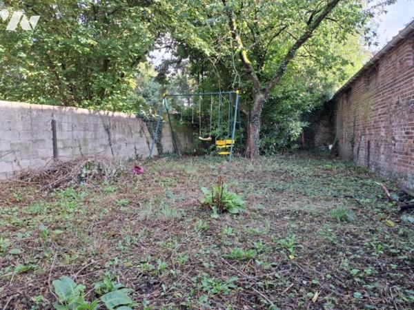 local commercial + appartement et jardin