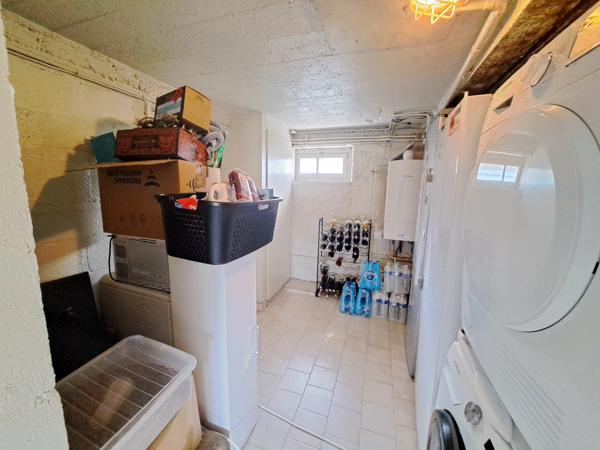 Maison sur sous-sol aménagé avec garage et jardin clos – 105 m² environ – 6 pièces