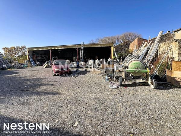 Terrain à bâtir de plus de 800 m² avec hangar métallique démontable