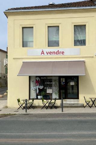IMMEUBLE AVEC LOGEMENT ET COMMERCE
