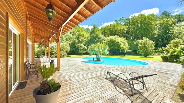 Propriété 202 m² avec parc de 4800 m², piscine et double garage