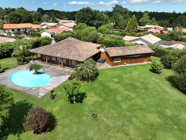Propriété 202 m² avec parc de 4800 m², piscine et double garage