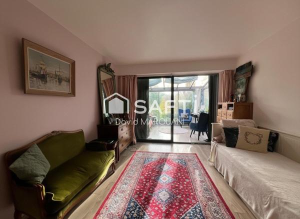 Maison familiale spacieuse avec jardin et garage