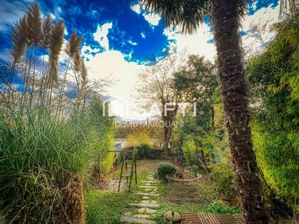 Maison familiale spacieuse avec jardin et garage