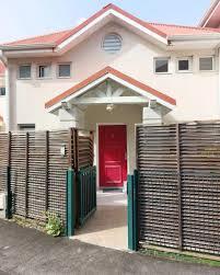 Moule (97160) À vendre - Villa mitoyenne au Moule avec locataire en place