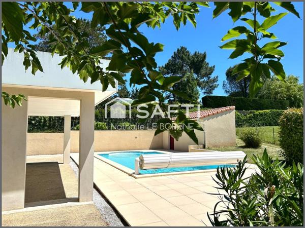 Jolie villa de plain sur demi sous sol avec piscine