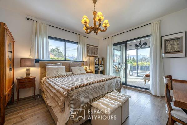 Maison d’architecte avec terrasses et jardin au bord du lac