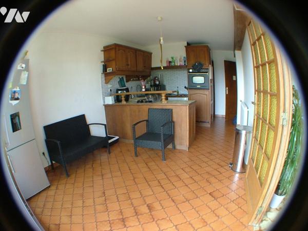 SAINT-GAUDENS centre, appartement T4 loué de 97,69 m² au 2ème étage sans ascenseur avec garage.