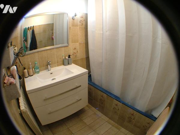 SAINT-GAUDENS centre, appartement T4 loué de 97,69 m² au 2ème étage sans ascenseur avec garage.