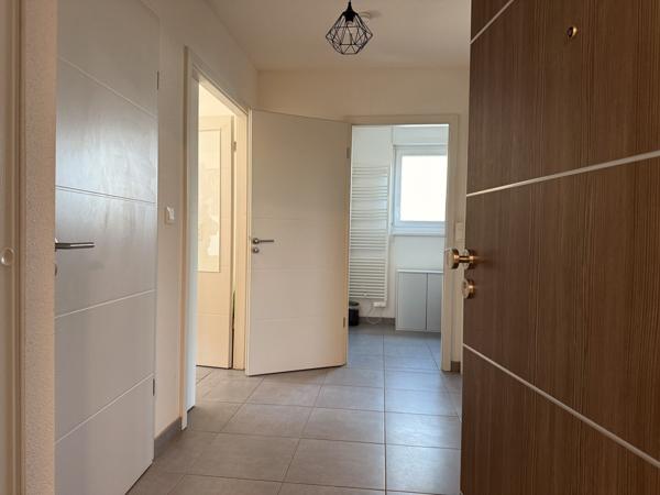 Appartement 3 pièces rez-de-jardin avec jardin et garage