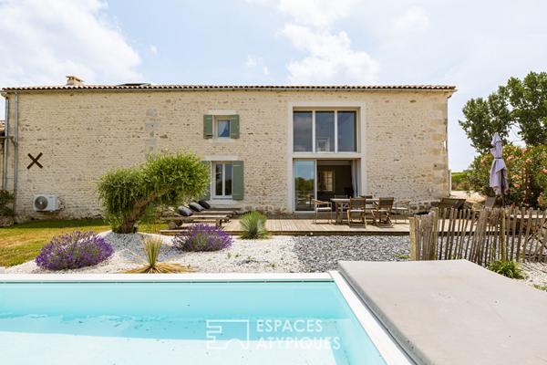 Propriété à la rénovation exceptionnelle mêlant charme et confort