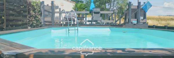 Maison familiale d'environ 100 m2 avec piscine, terrain arboré et grand garage au calme de la campagne ardéchoise
