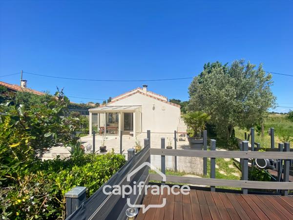 Maison familiale d'environ 100 m2 avec piscine, terrain arboré et grand garage au calme de la campagne ardéchoise