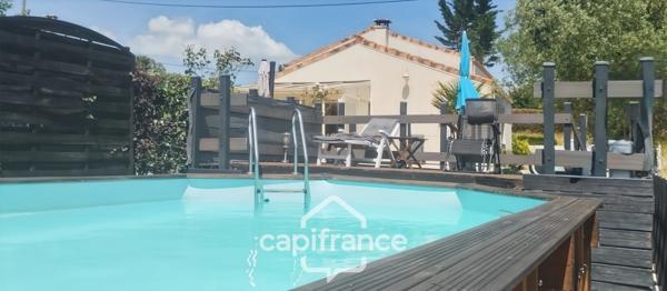 Maison familiale d'environ 100 m2 avec piscine, terrain arboré et grand garage au calme de la campagne ardéchoise