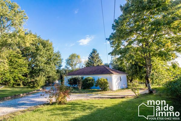 Maison plain-pied rénovée et vaste terrain constructible