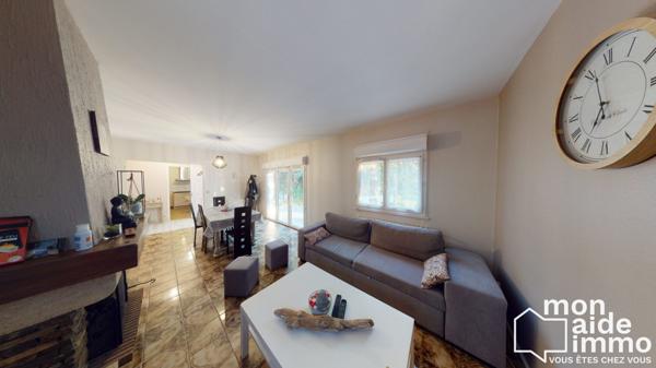 Maison plain-pied rénovée et vaste terrain constructible