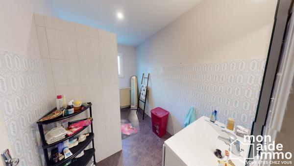 Maison plain-pied rénovée et vaste terrain constructible