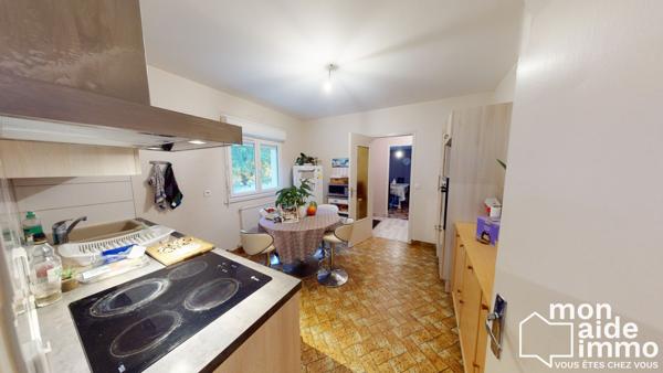 Maison plain-pied rénovée et vaste terrain constructible