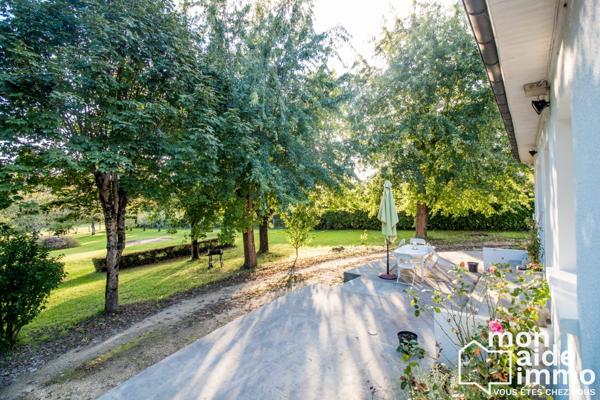 Maison plain-pied rénovée et vaste terrain constructible