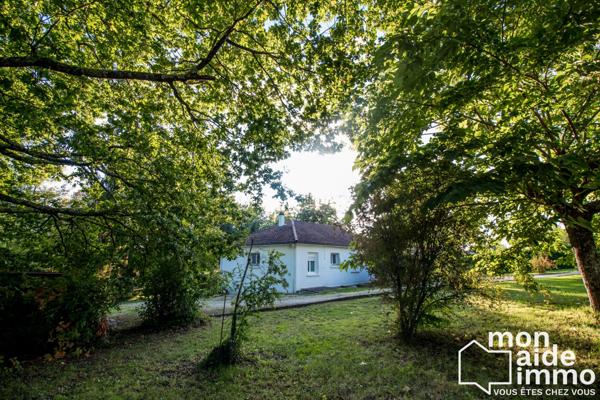 Maison plain-pied rénovée et vaste terrain constructible