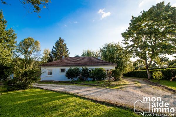 Maison plain-pied rénovée et vaste terrain constructible