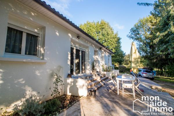 Maison plain-pied rénovée et vaste terrain constructible