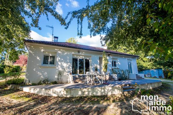 Maison plain-pied rénovée et vaste terrain constructible