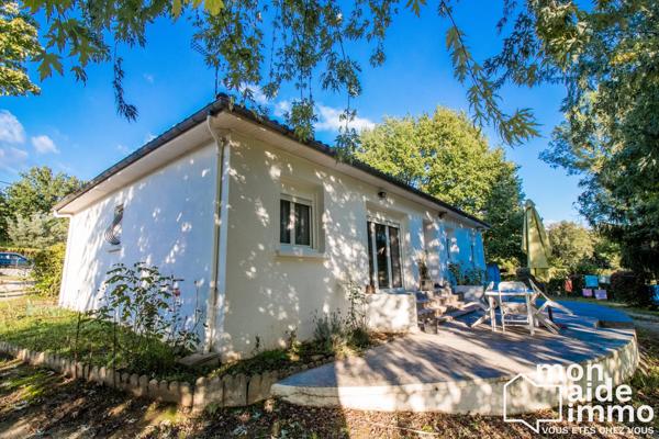 Maison plain-pied rénovée et vaste terrain constructible