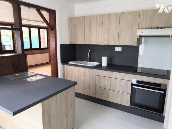 Commune de POIX DE PICARDIE, une maison sur un terrain de 939m² comprenant :