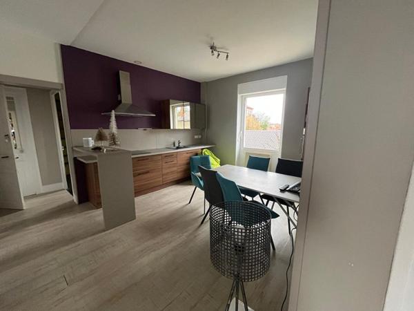 Ensemble immobilier mixte - appartement et locaux commerciaux