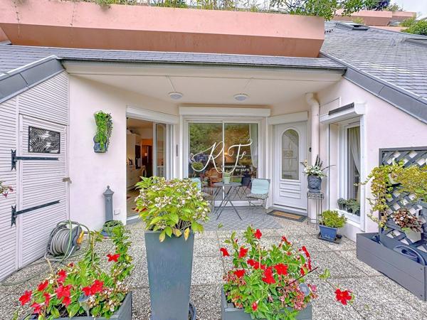 appartement de plain pied avec un grand jardin