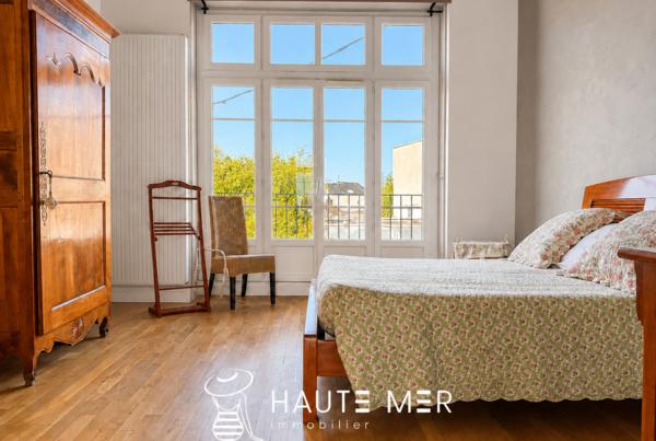 JUNE – Appartement de 114 m2 avec garage situé dans un immeuble de caractère