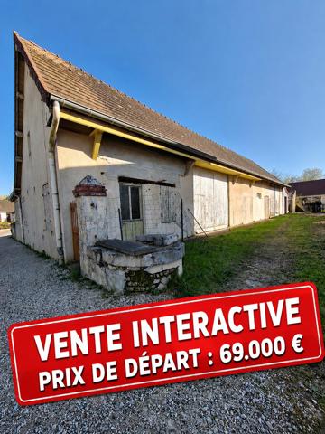 Bâtisse à fort potentiel, en vente interactive