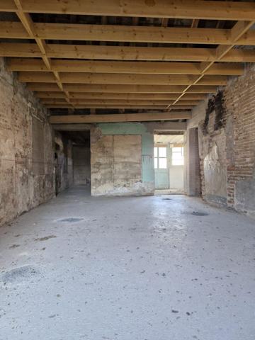 Bâtisse à fort potentiel, en vente interactive