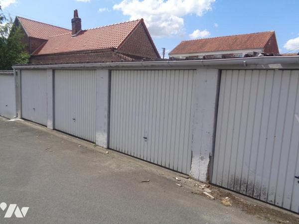 Ensemble immobilier composé de 4 appartements de type 3 et de 3 garages 