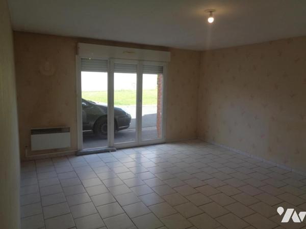 Ensemble immobilier composé de 4 appartements de type 3 et de 3 garages 