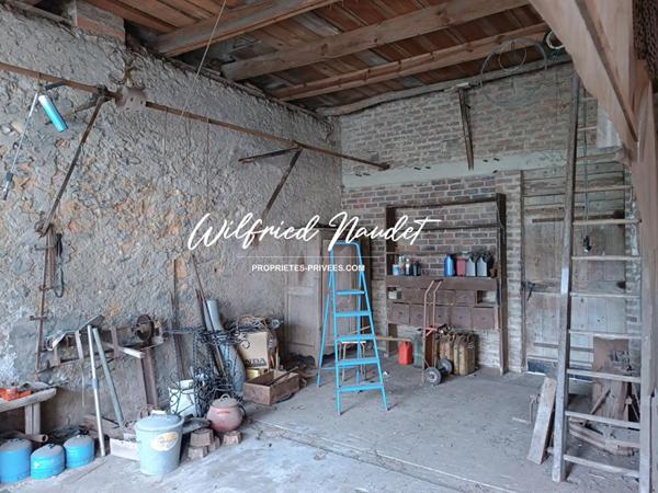 Ensemble Immobilier sur terrain constructible au Centre d'Ecommoy