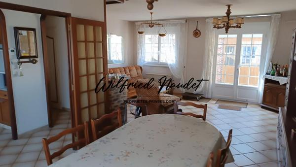 Ensemble Immobilier sur terrain constructible au Centre d'Ecommoy