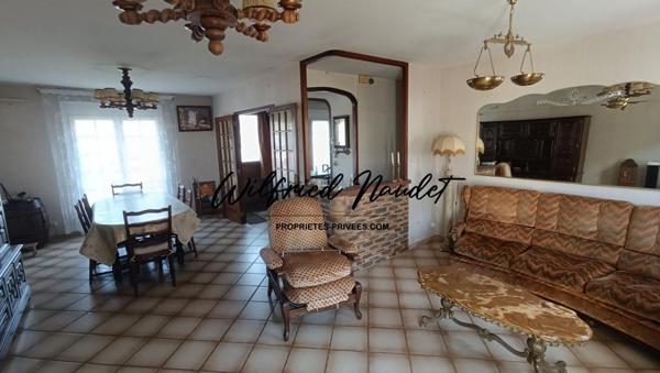 Ensemble Immobilier sur terrain constructible au Centre d'Ecommoy