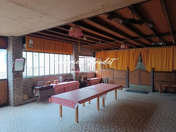 Ensemble Immobilier sur terrain constructible au Centre d'Ecommoy