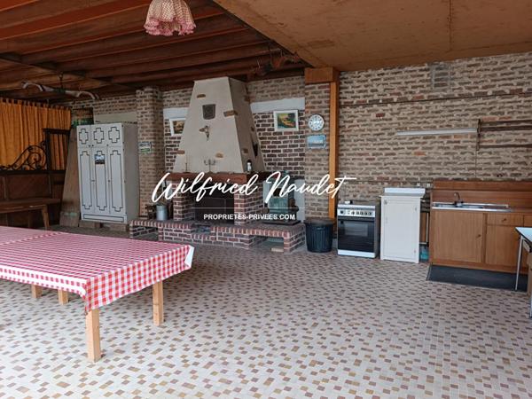 Ensemble Immobilier sur terrain constructible au Centre d'Ecommoy