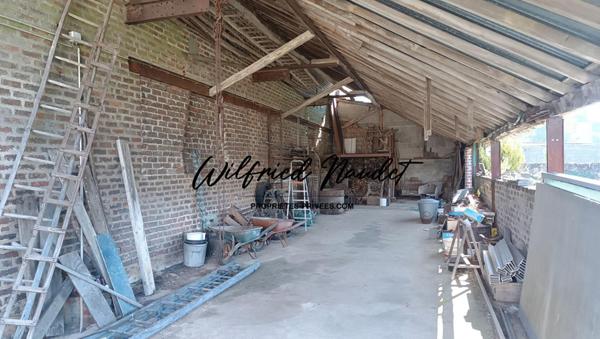 Ensemble Immobilier sur terrain constructible au Centre d'Ecommoy