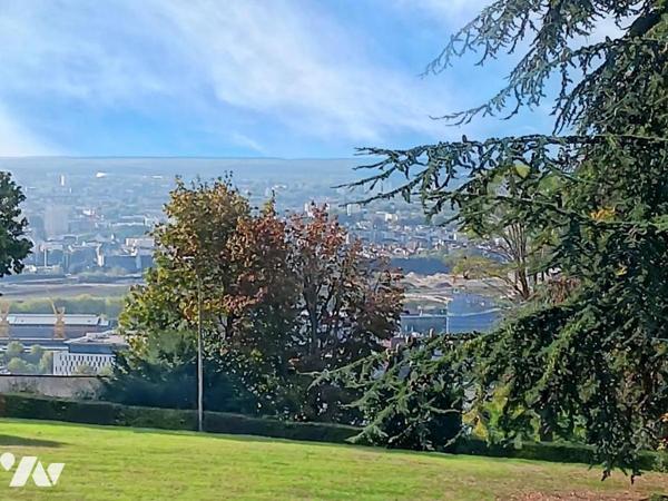 SPACIEUX APPARTEMENT DANS CADRE EXCEPTIONEL