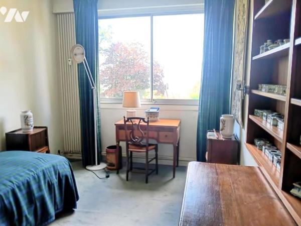 SPACIEUX APPARTEMENT DANS CADRE EXCEPTIONEL