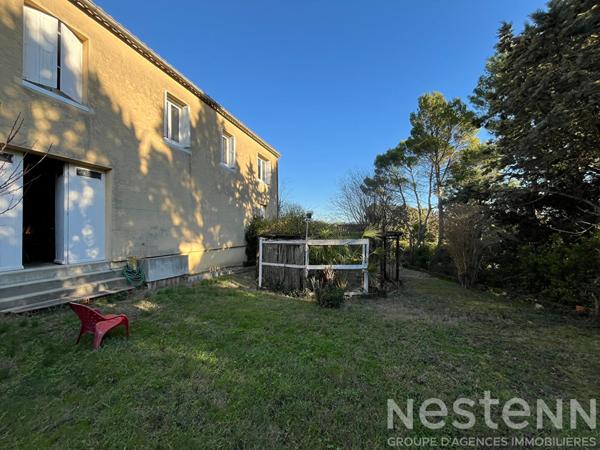 Carcassonne maison traditionnelle 129 m² 4 chambres terrain 1 100 m² sous-sol garages jardin arboré chauffage gaz