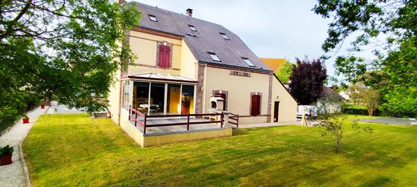 Propriété dans un cadre verdoyant !