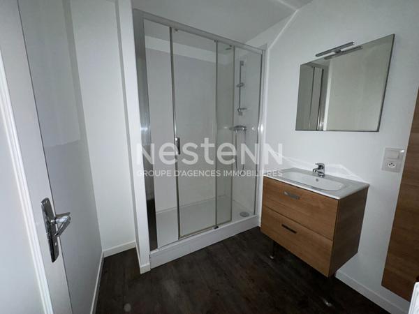 À Vendre - Appartement de 86 m²- 3 chambres en centre-ville de Locminé avec cour privative