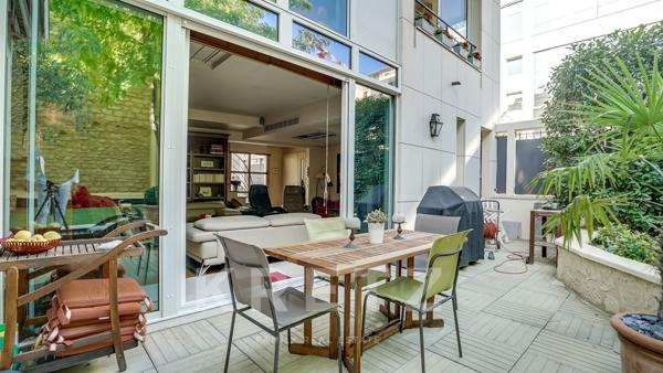 Maison d'architecte sur jardin arboré