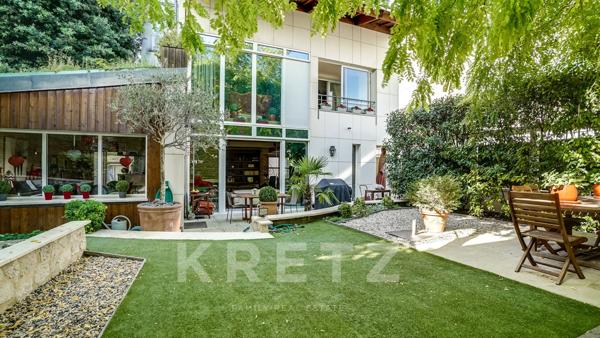 Maison d'architecte sur jardin arboré