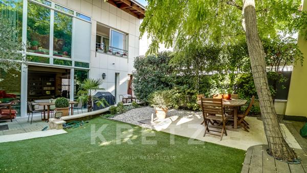 Maison d'architecte sur jardin arboré